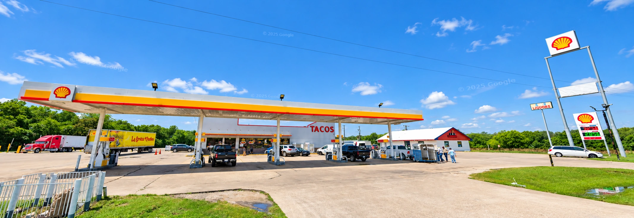 Enhanced panorama of the Shell canopy, fuel pumps and taco store at McDonald Fuel Stop