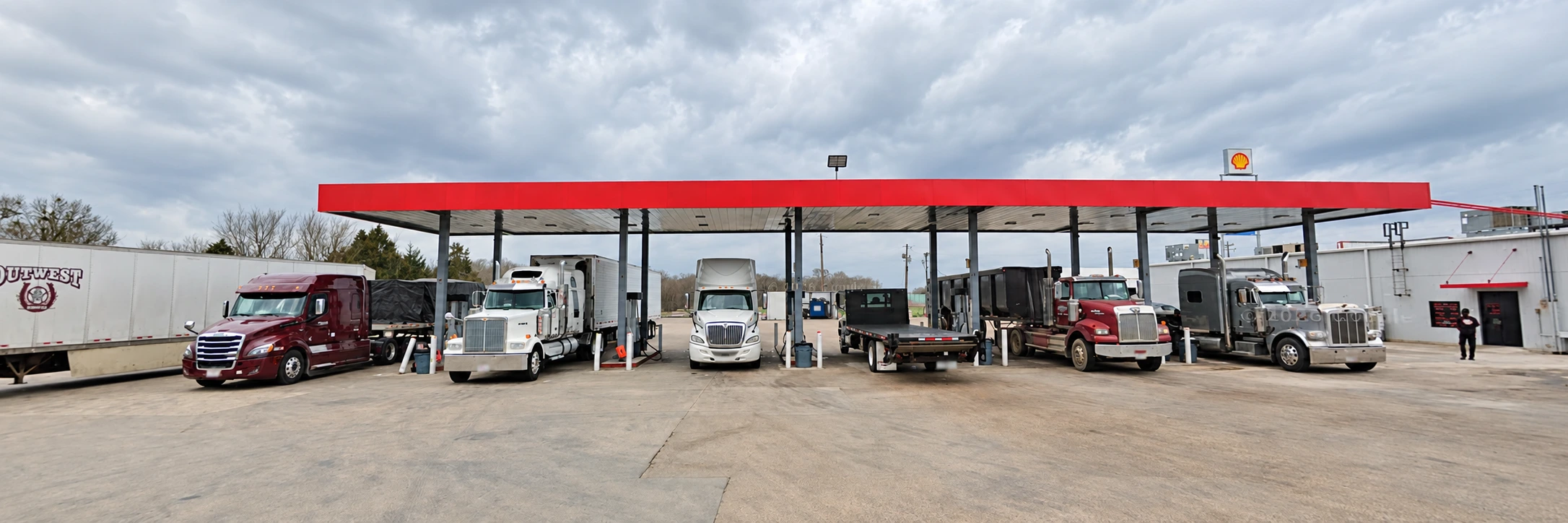 Semi trucks at the McDonald Fuel Stop diesel lanes